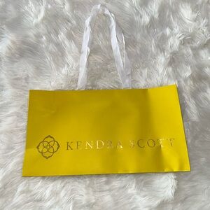 One XL extra large yellow and gold and white kendra scott gift bag available